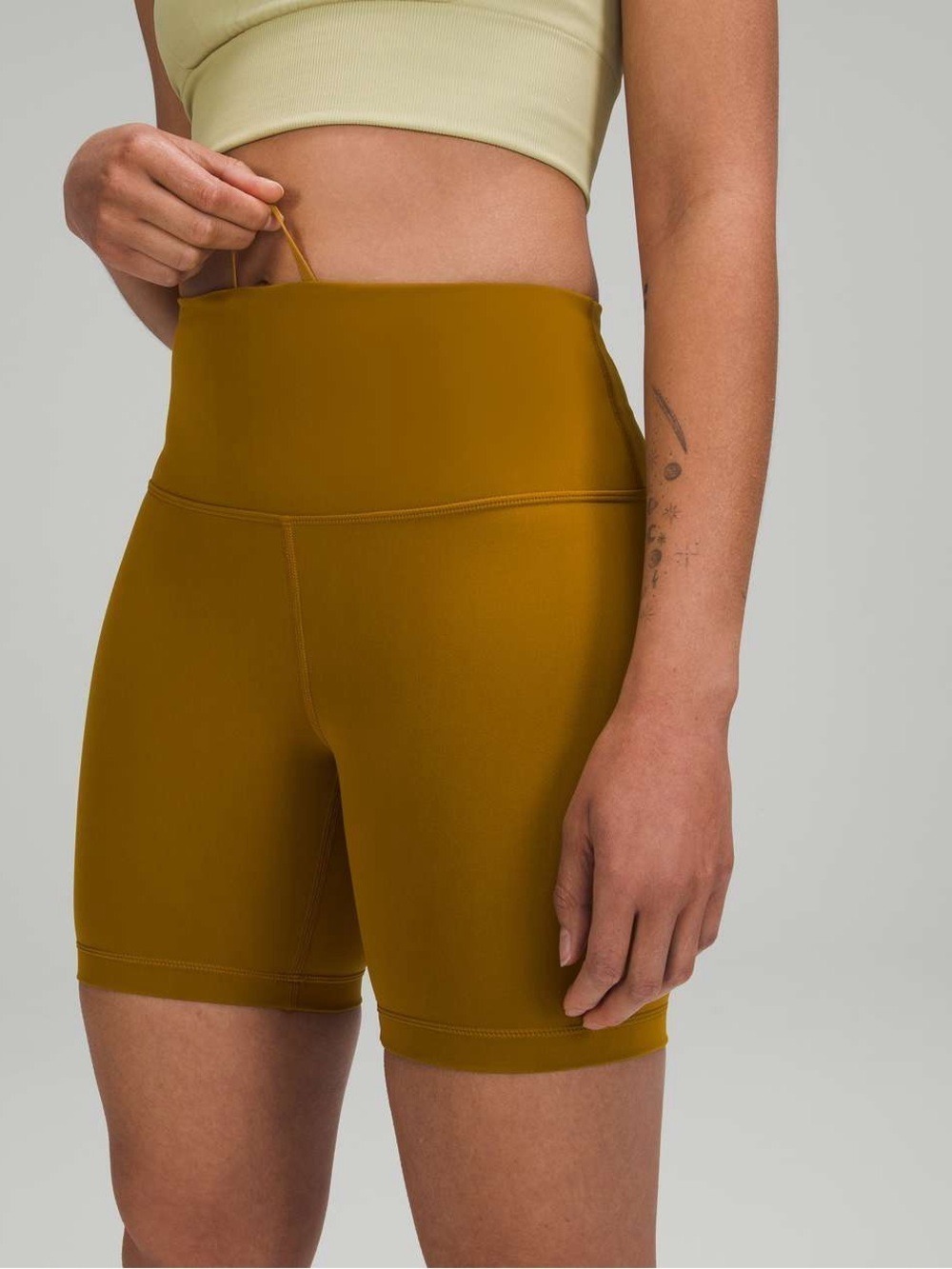 lululemon athletica Wunder Train High-Rise Bike Shorts in Gold Spice Size 4